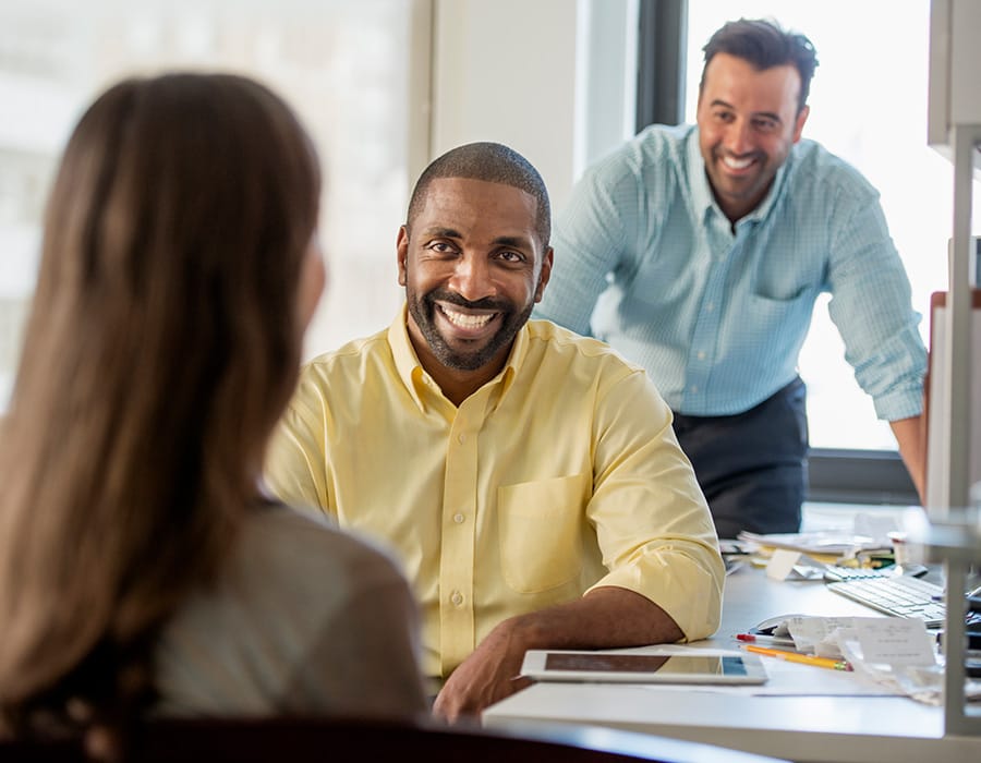 Three people in an office two men and a woman wi 2022 03 04 02 31 48 utc 1.jpg